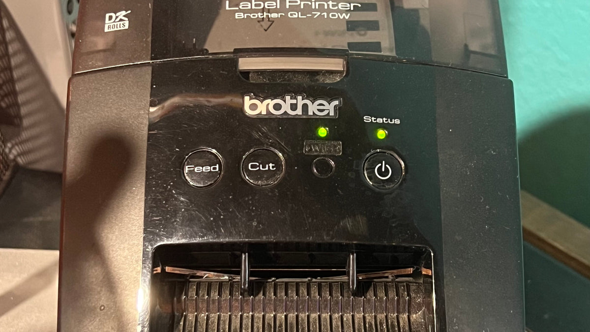 Brother QL Label Printer and Tape Roll Hero Banner